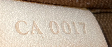 Riveting Pochette Accessoires Monogram Canvas