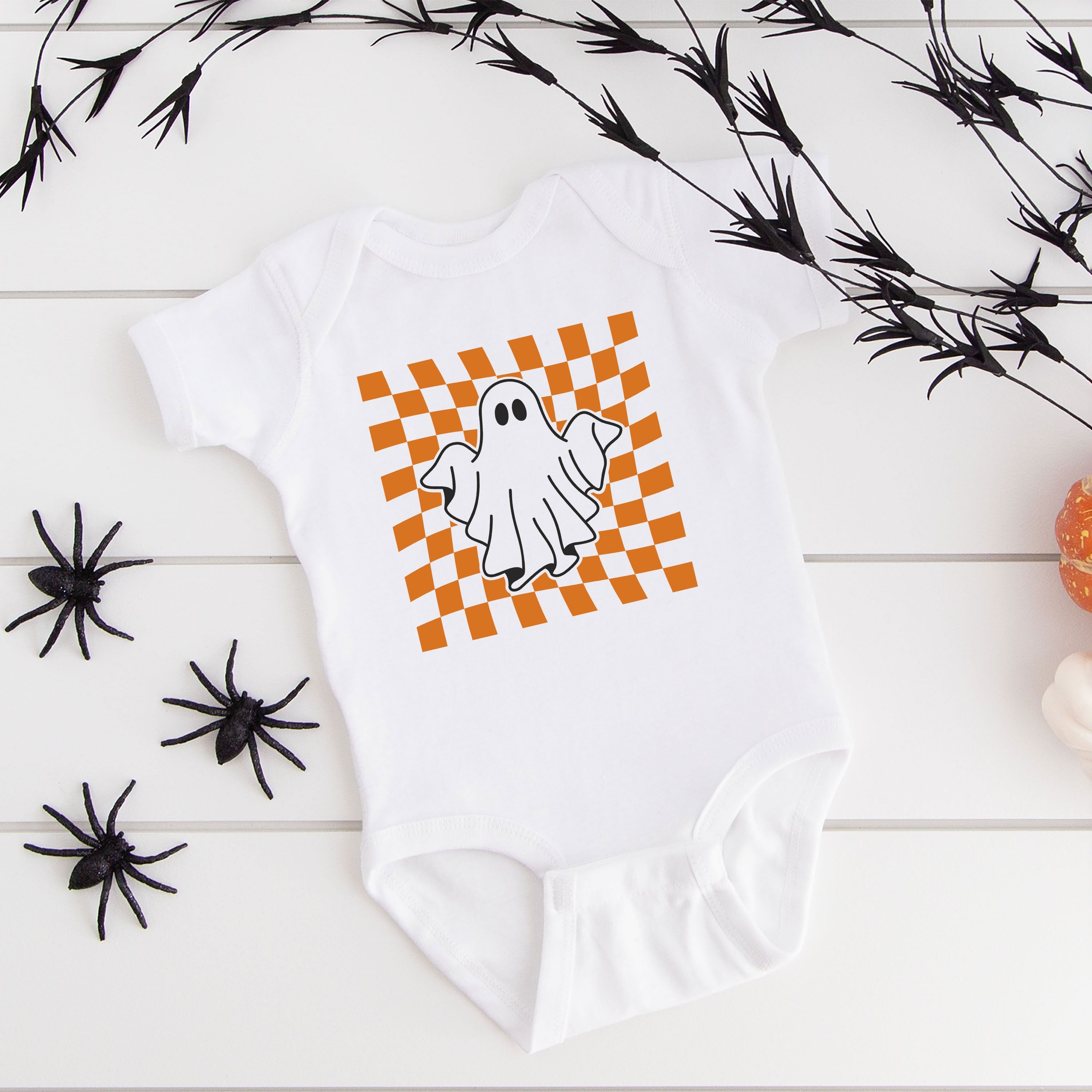 The Juniper Shop Baby Checkered Ghost Graphic Short Sleeve Onesie