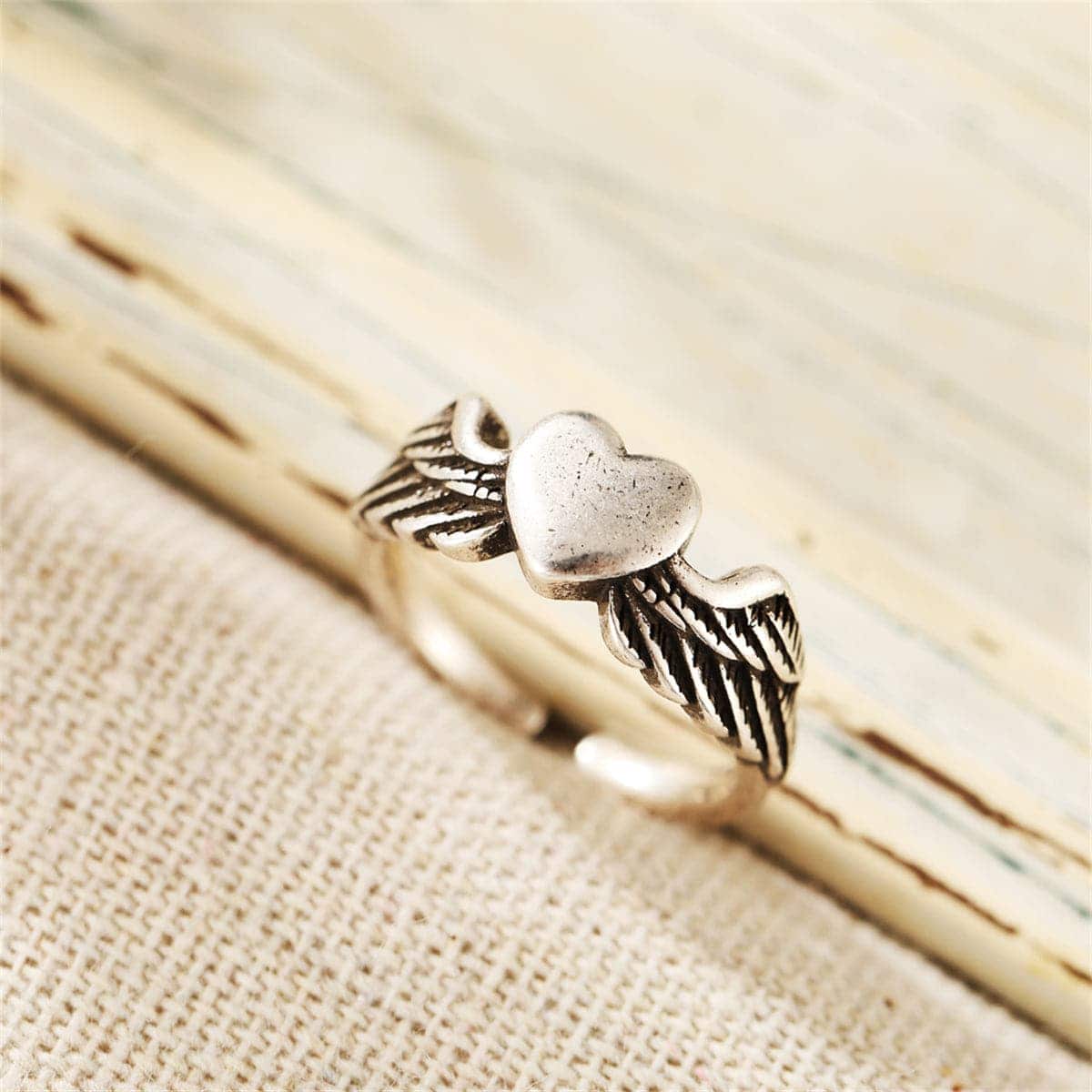 Silvertone Flying Heart Open Ring