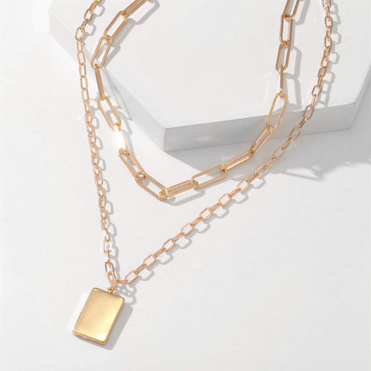 Goldtone Tag Pendant Necklace Set