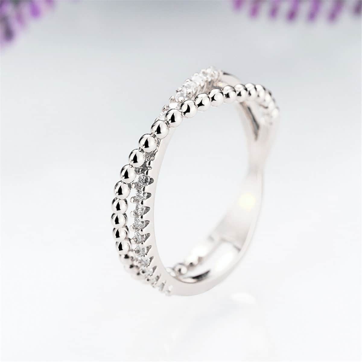 Cubic Zirconia & Silvertone Crossed Line Ring