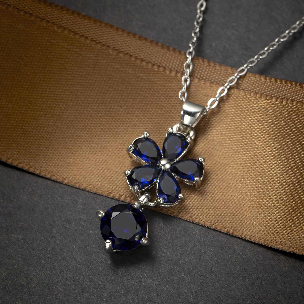 Navy Crystal & Silvertone Floral Pendant Necklace