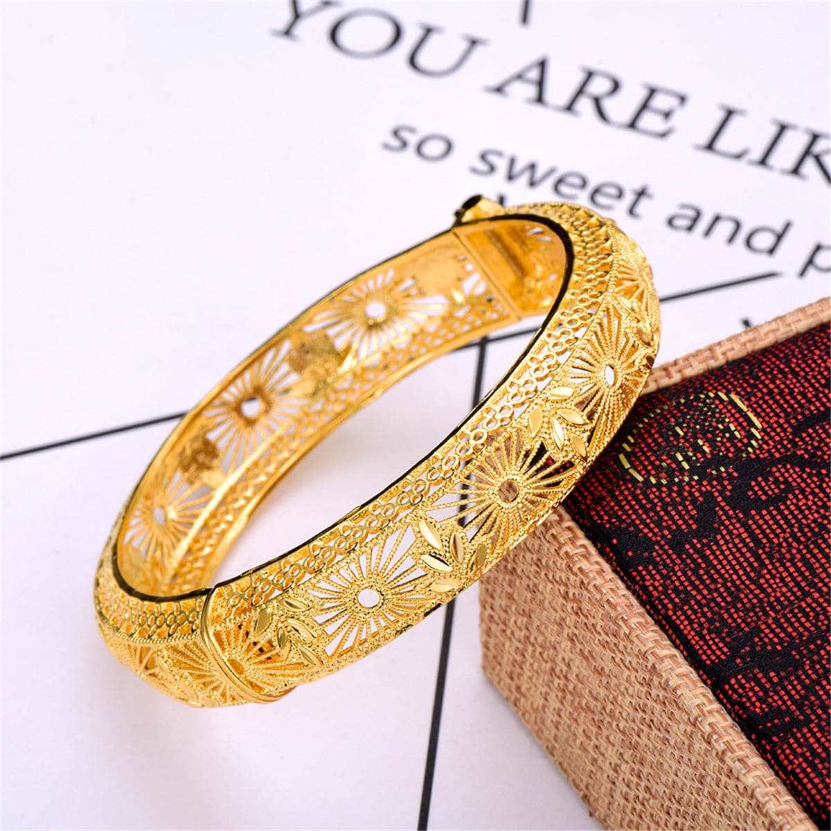 Goldtone Openwork Hollow Bangle