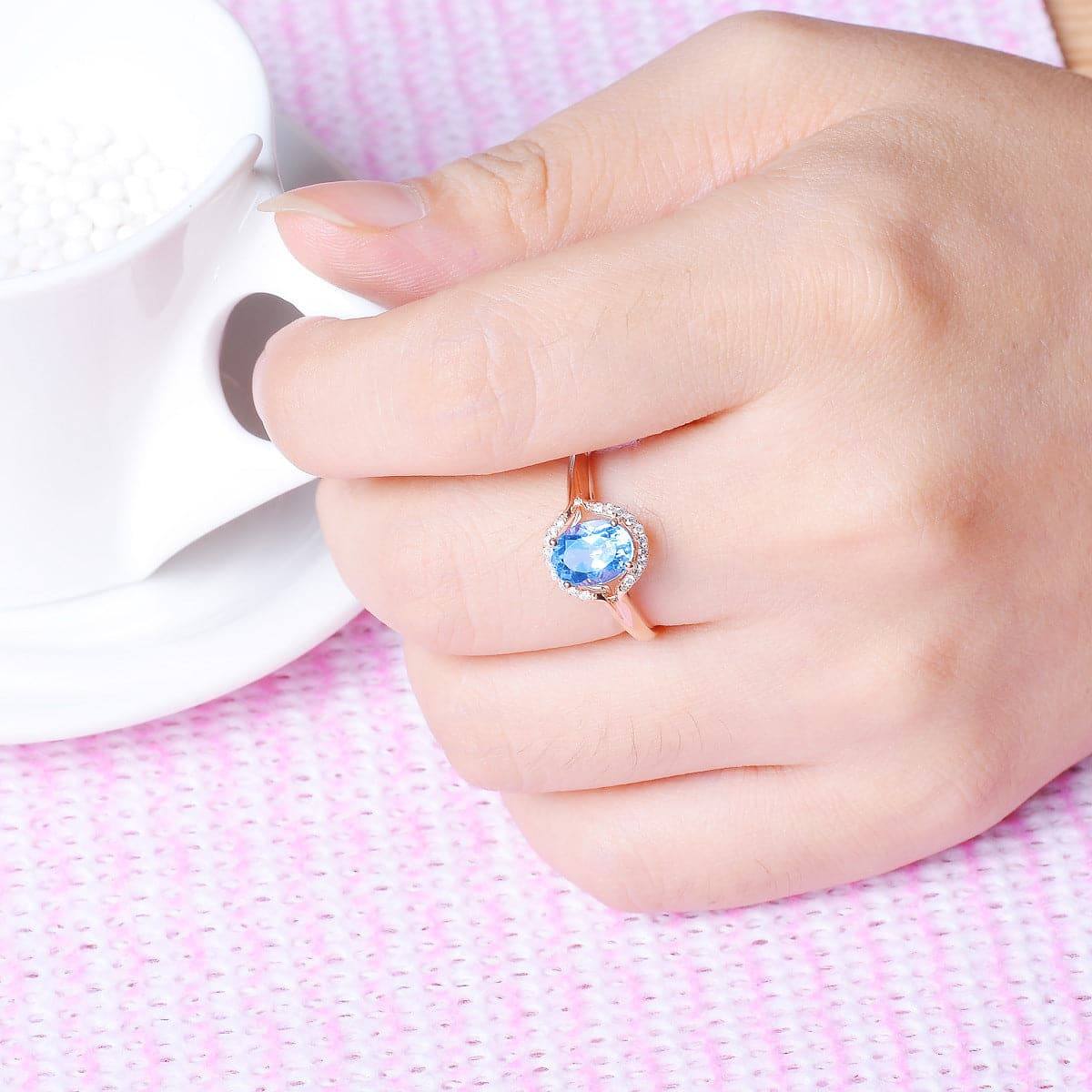 Blue Crystal & Cubic Zirconia Rose Goldtone Halo Oval Ring