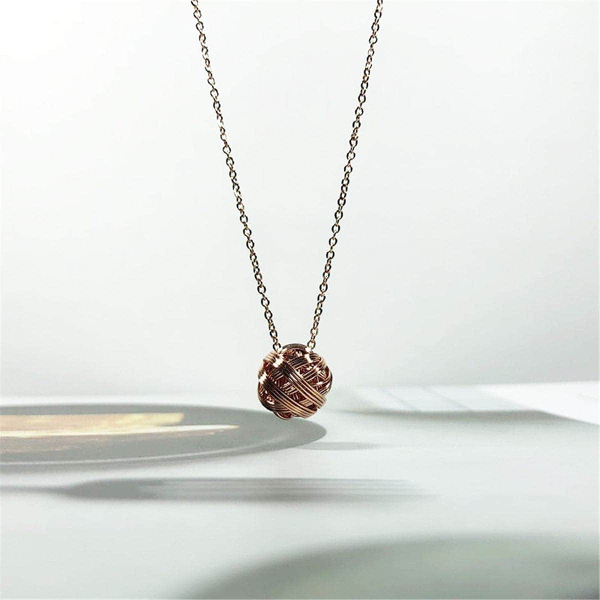 Rose Goldtone String Ball Pendant Necklace