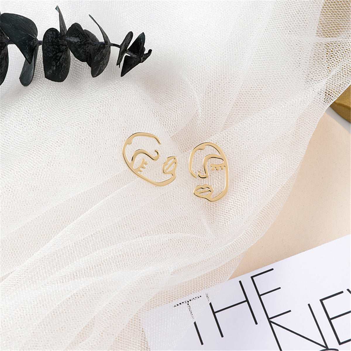 Goldtone Abstract Face Stud Earrings