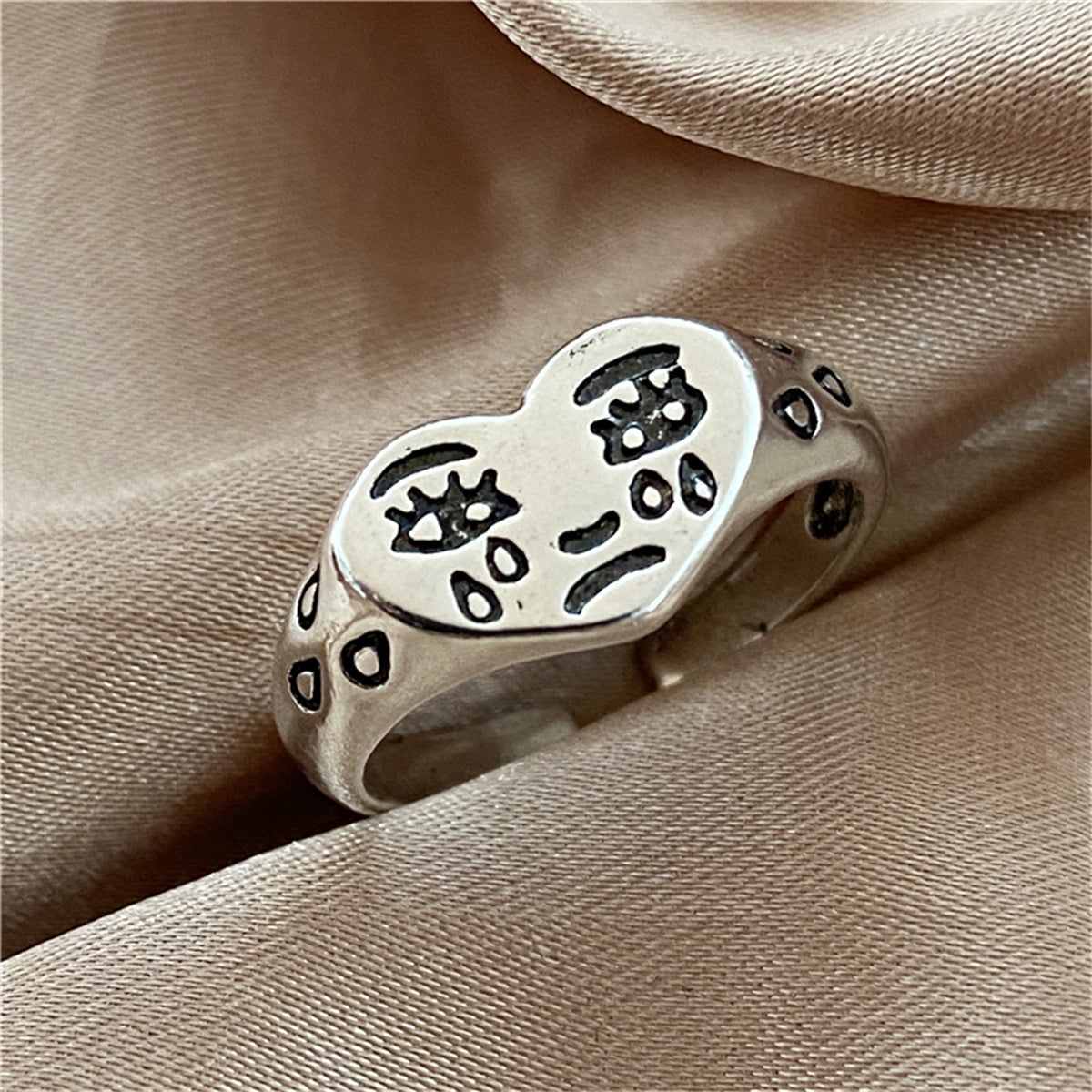 Silvertone Crying Heart Open Band Ring