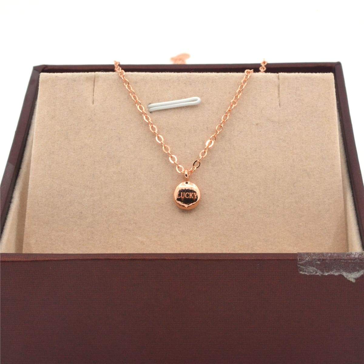 Rose Goldtone 'Lucky' Round Pendant Necklace