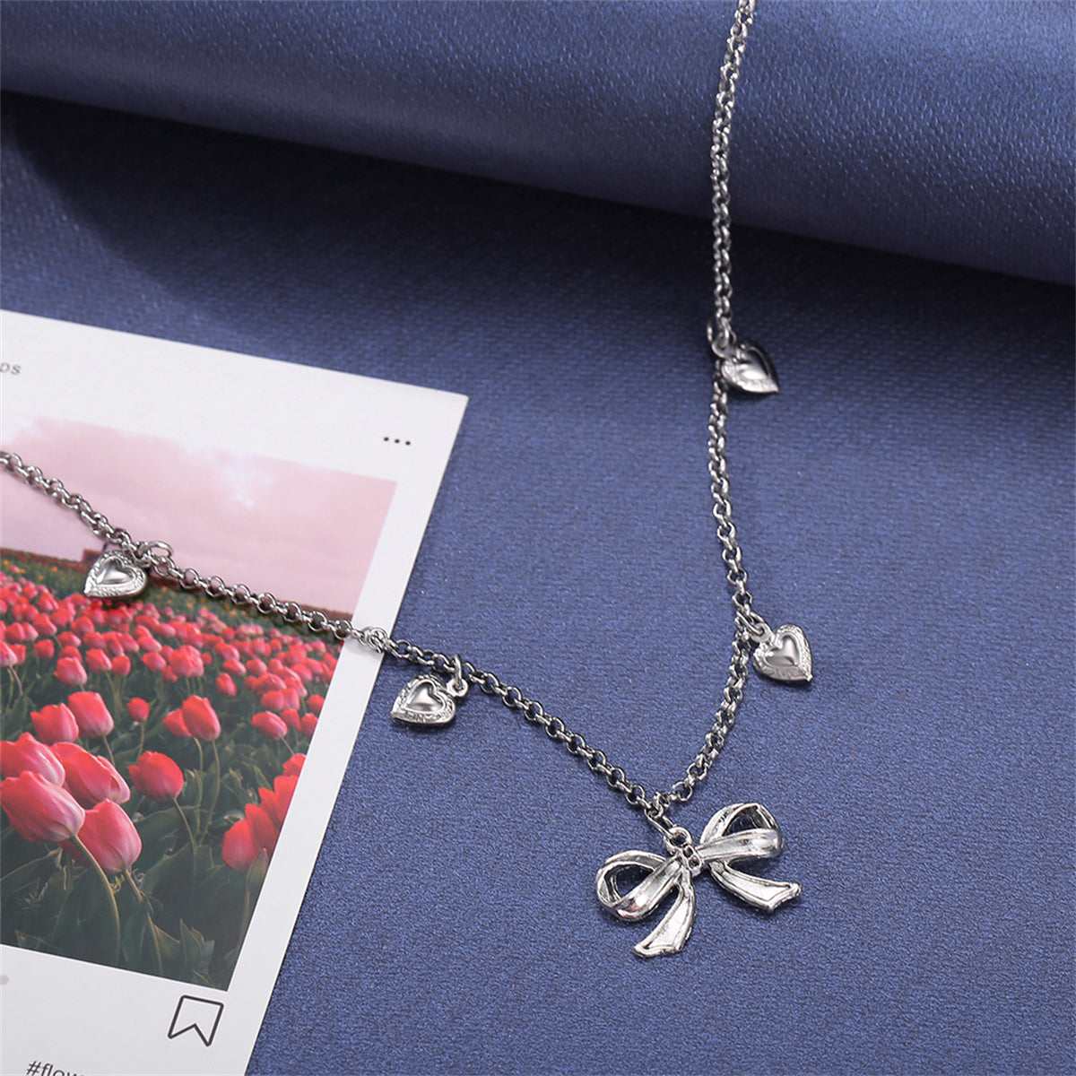 Silvertone Bow Heart Station Necklace