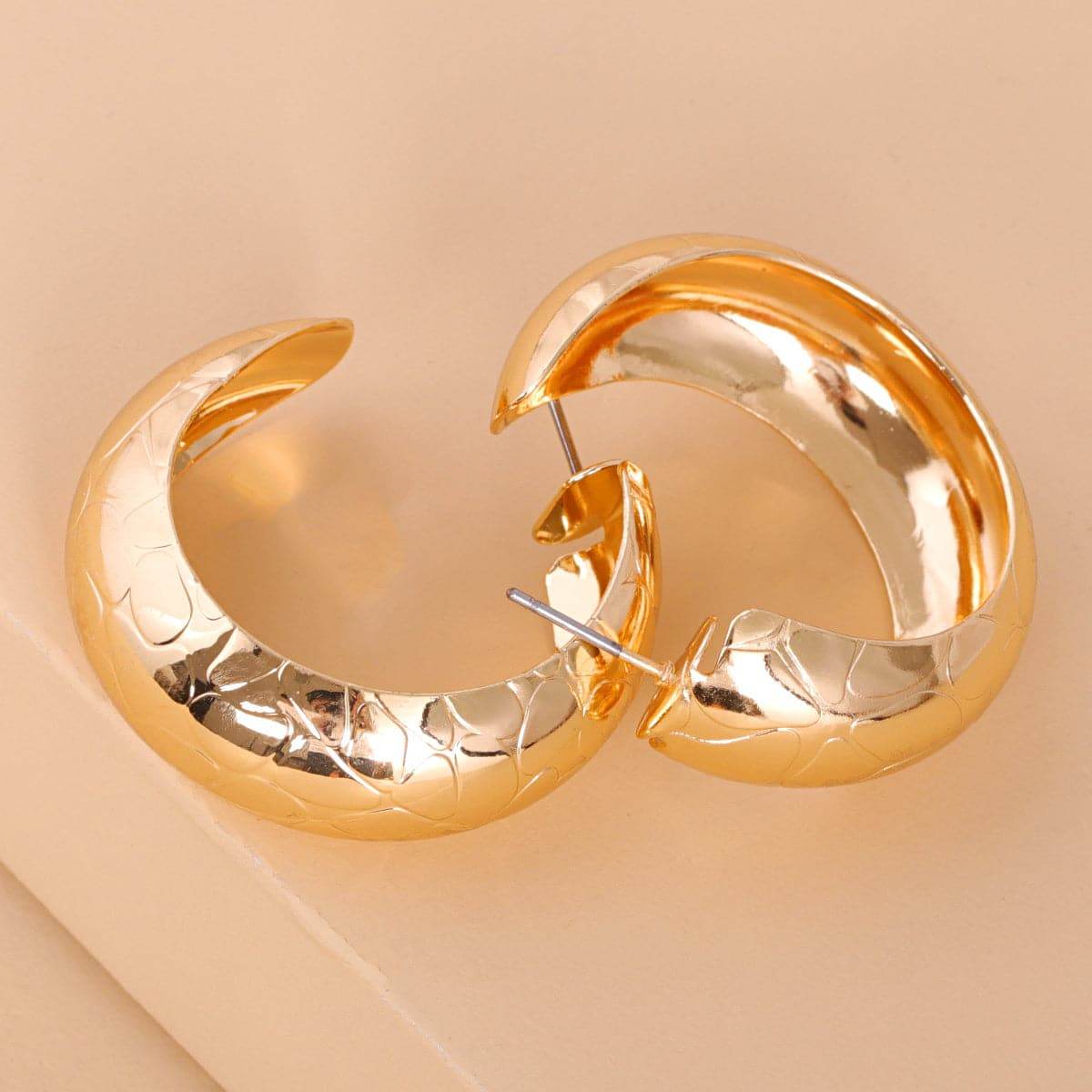 Goldtone Serpentine Hoop Earrings
