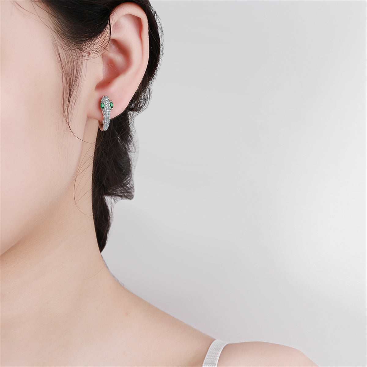 Green Crystal & Cubic Zirconia Silvertone Snake Huggie Earrings