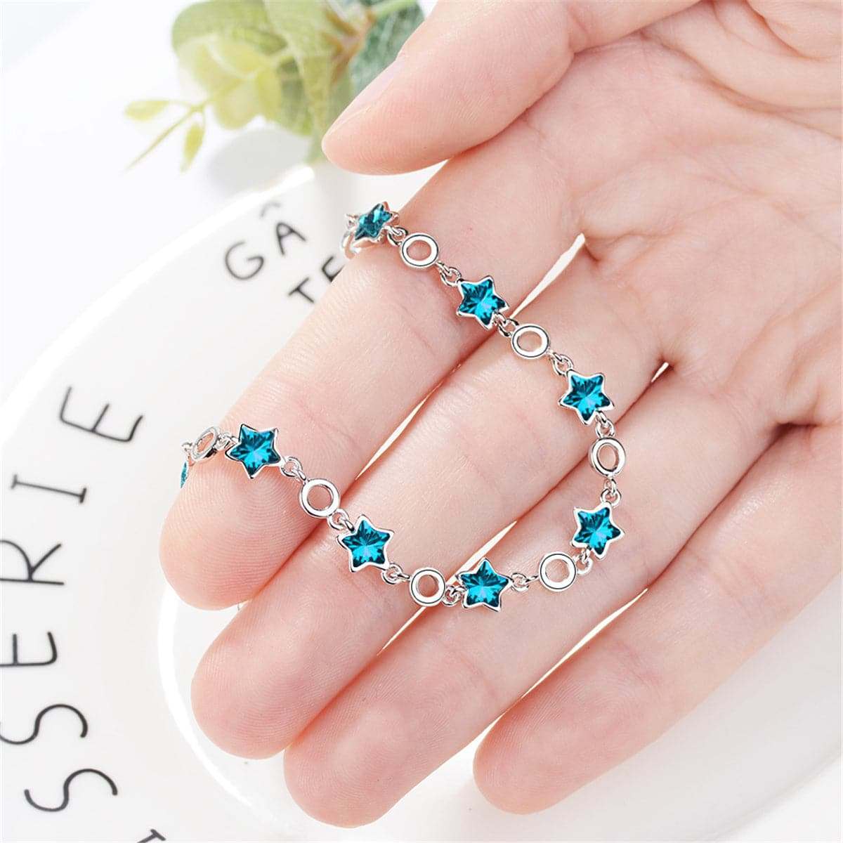 Blue Crystal & Silvertone Star Station Bracelet