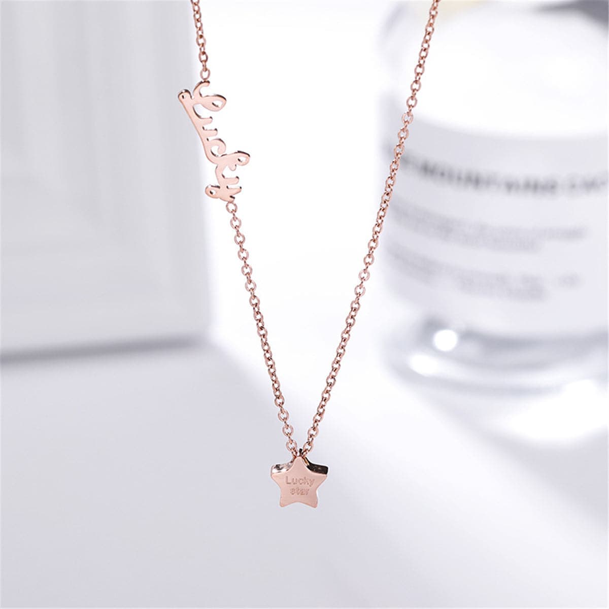 Rose Goldtone 'Lucky' Star Pendant Necklace