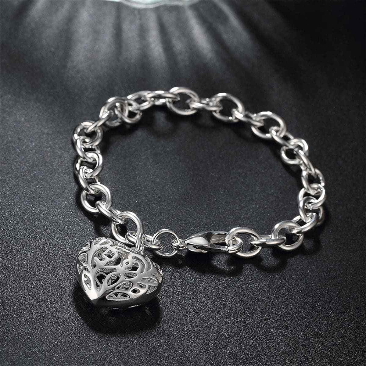 Silvertone Cutout Heart Charm Bracelet