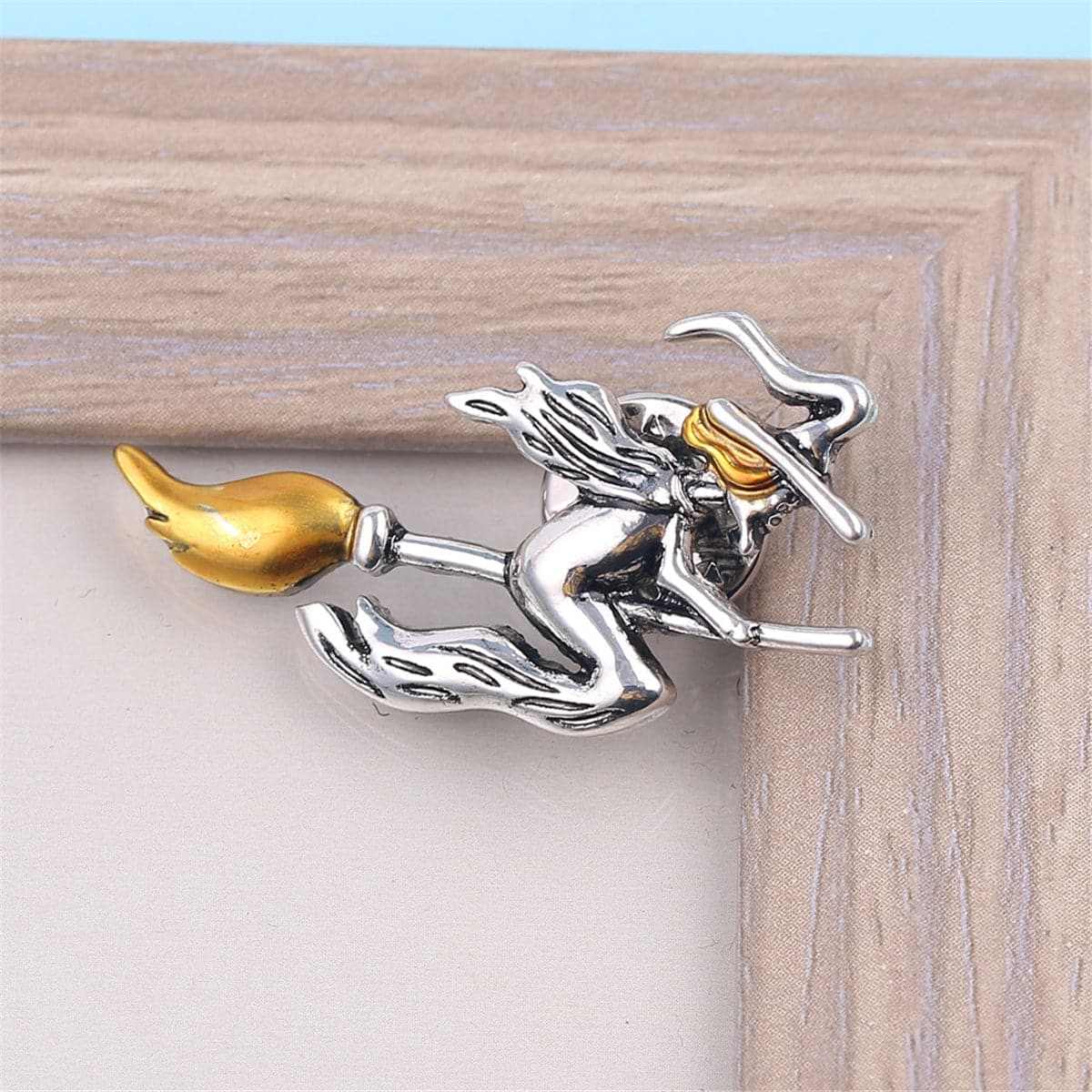 Yellow & Silvertone Flying Witch Brooch
