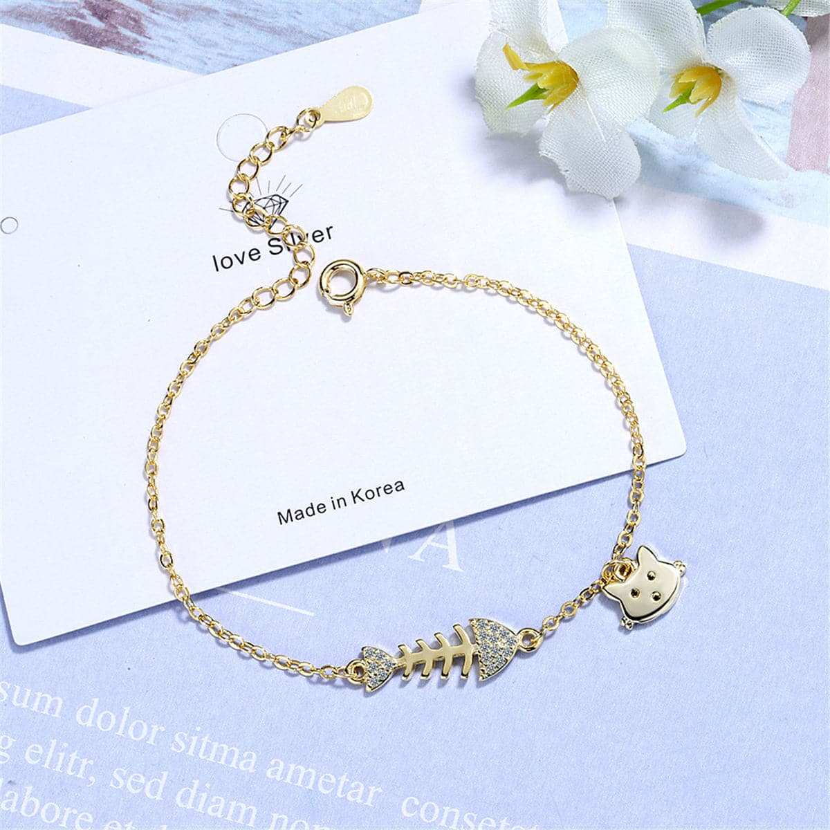 Cubic Zirconia & Goldtone Fishbone & Cat Charm Bracelet