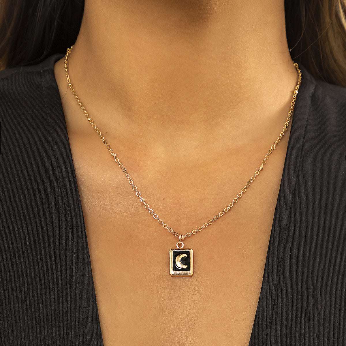 Black Enamel & Goldtone Moon Card Pendant Necklace