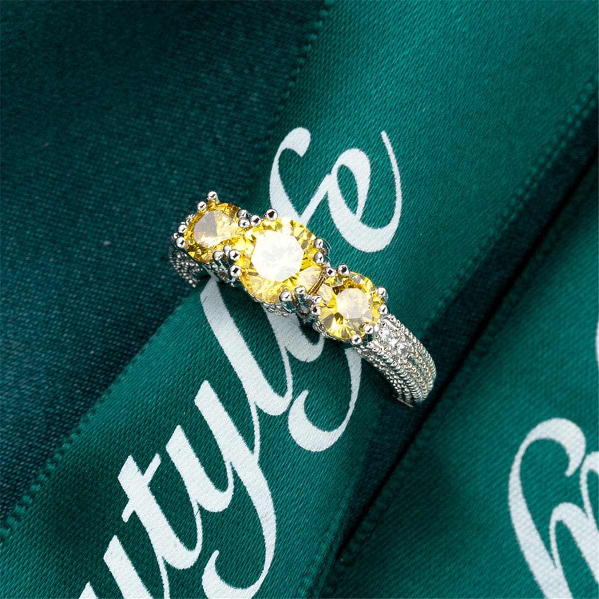 Yellow Crystal & Silvertone Three-Stone Ring
