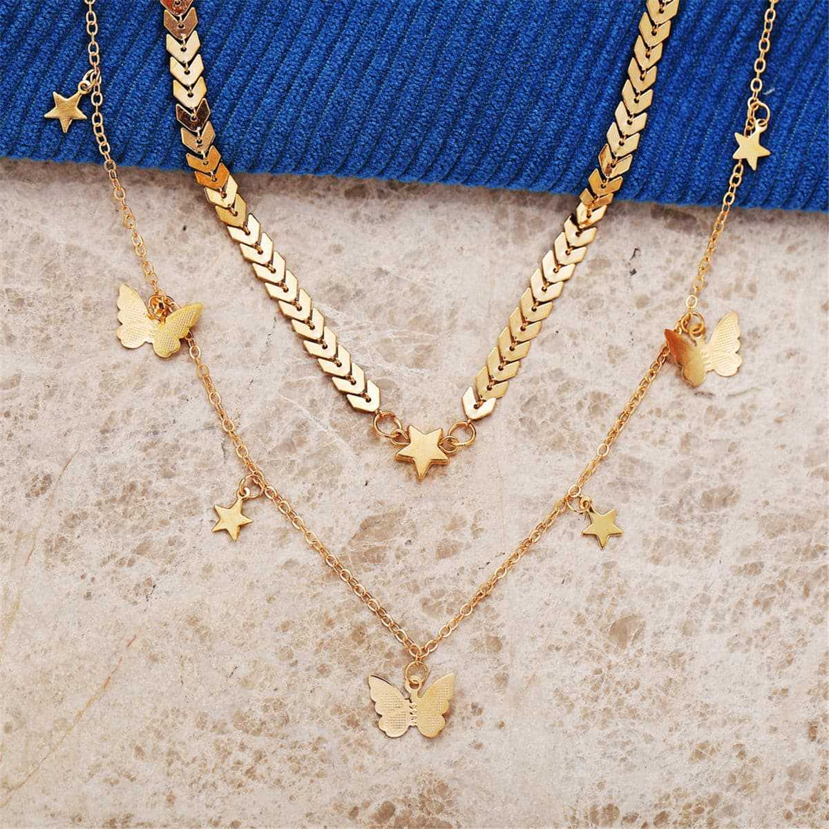 Goldtone Star & Butterfly Layer Necklace