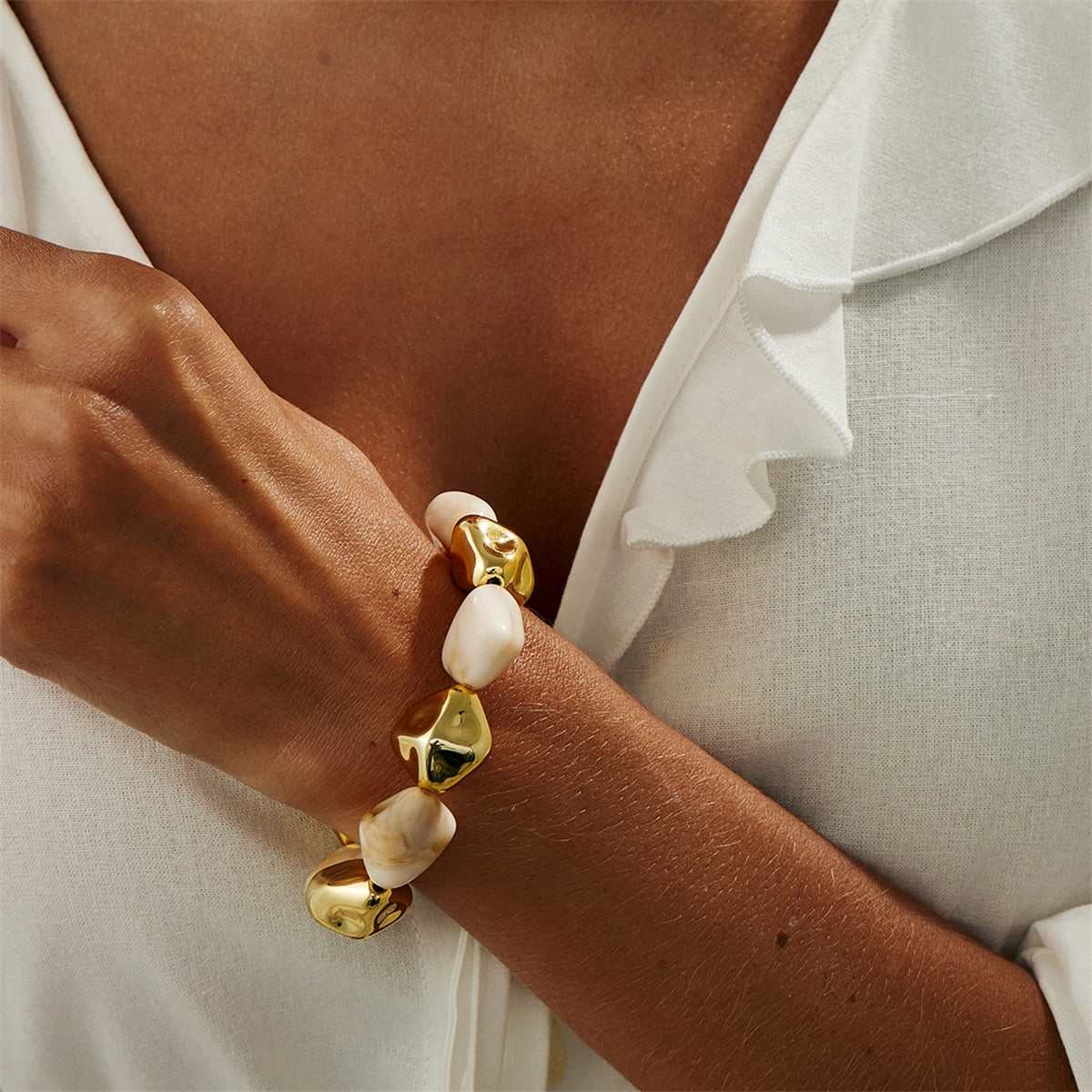 Beige Resin & Goldtone Irregular Beads Station Stretch Bracelet