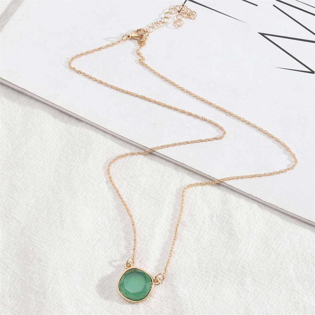 Green Crystal & Goldtone Round Pendant Necklace
