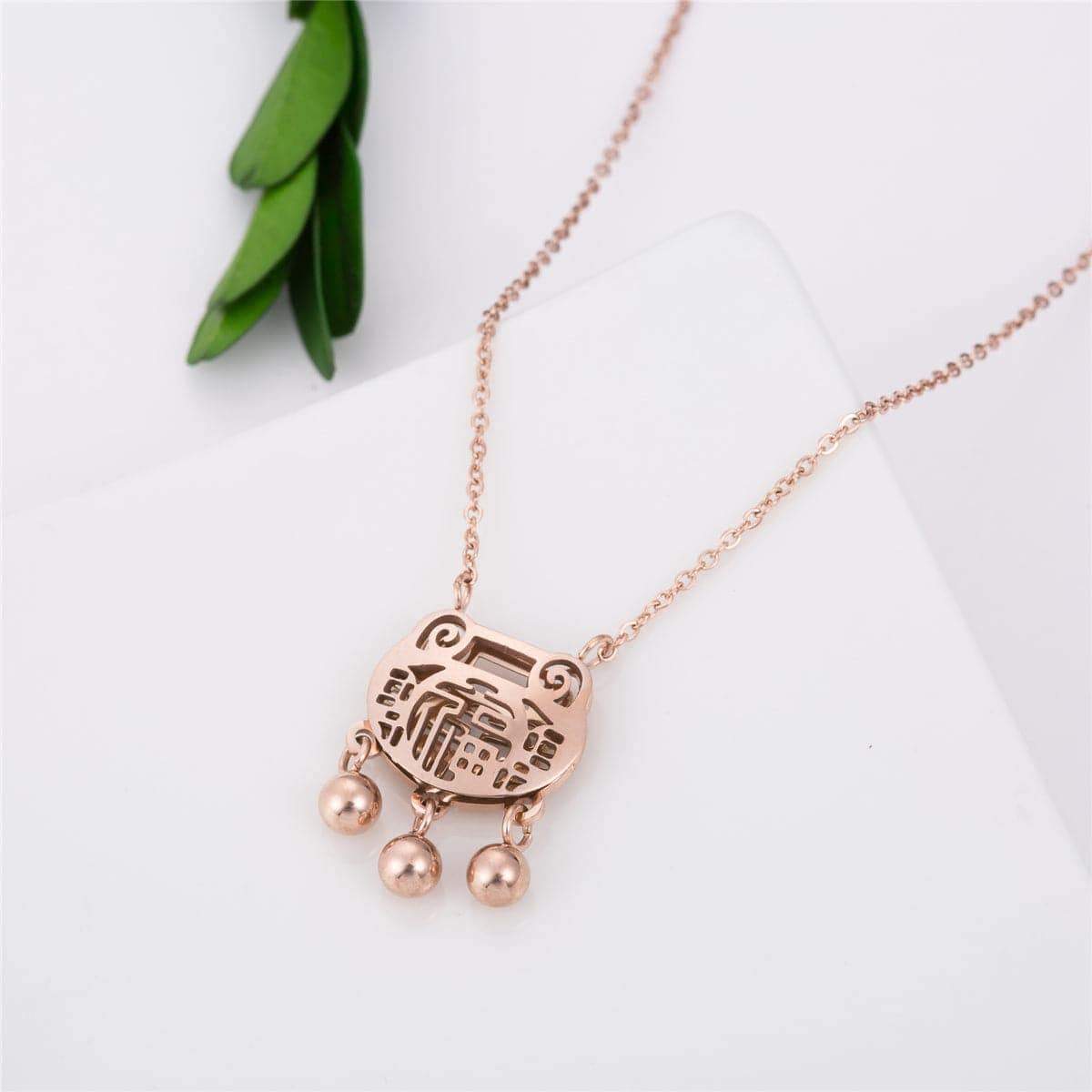 Rose Goldtone Lock Of Longevity Pendant Necklace