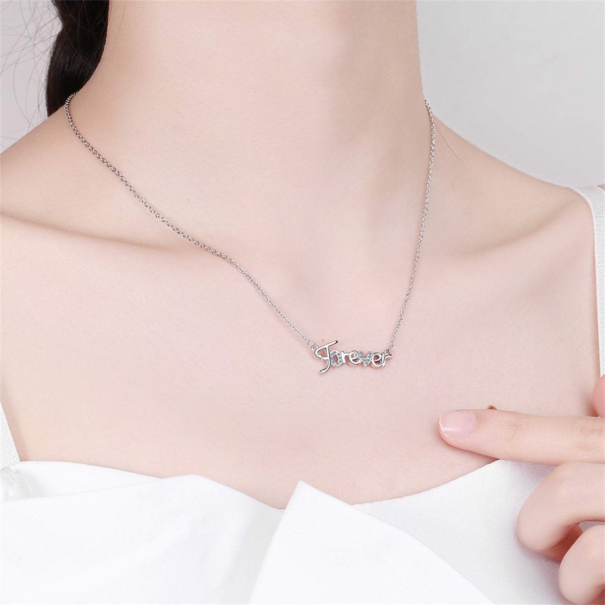 Cubic Zirconia & Silvertone 'Forever' Pendant Necklace