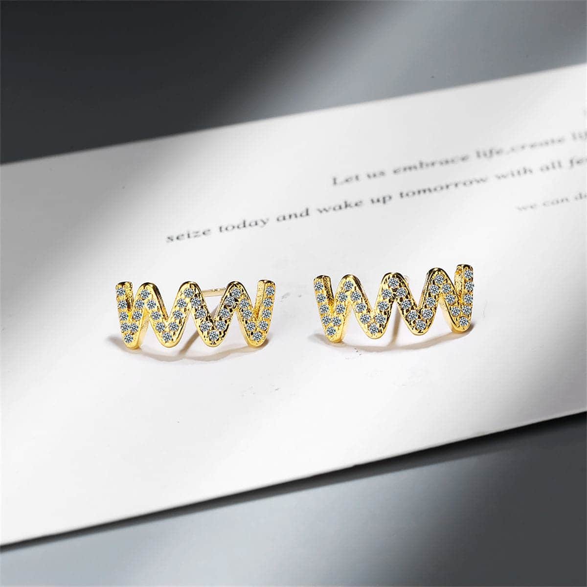Cubic Zirconia & Goldtone Wave Stud Earrings