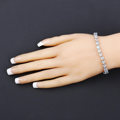 Heart Sky Blue Topaz Prong Silver Tennis Bracelet