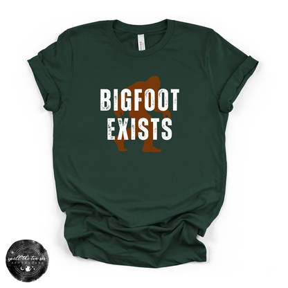 Bigfoot Exists Tee | Funny Cryptid Graphic T-Shirt (WHITE DESIGN)