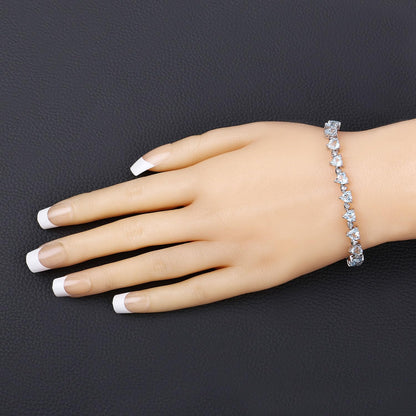 Heart Blue Topaz & Diamond Prong Silver Tennis Bracelet