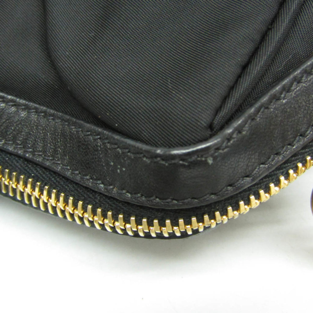 Prada Tessuto · Nylon & Leather