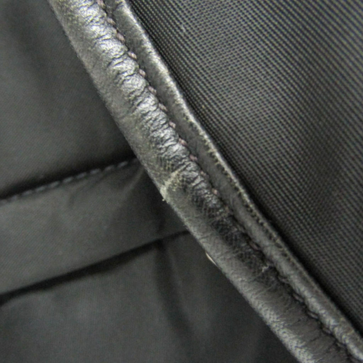 Prada Tessuto · Nylon & Leather