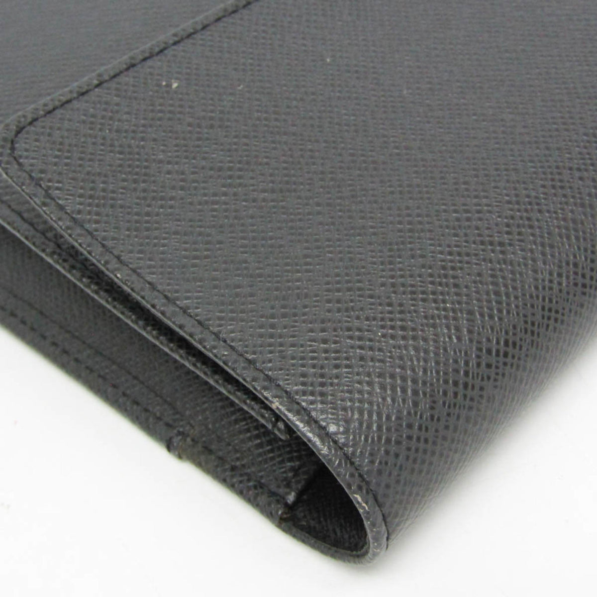 Louis Vuitton Taiga Selenga · Clutch