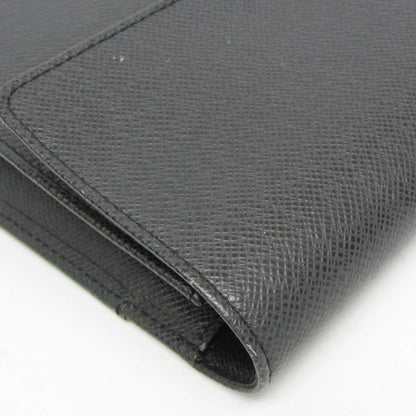 Louis Vuitton Taiga Selenga · Clutch