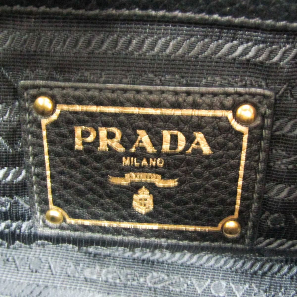 Prada Vitello Phenix · Leather