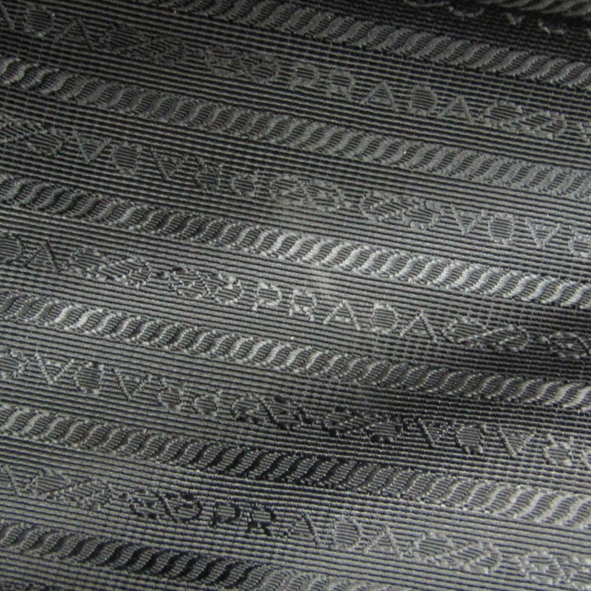 Prada Logo Jacquard · Leather