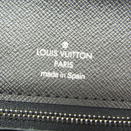 Louis Vuitton Taiga Selenga · Clutch
