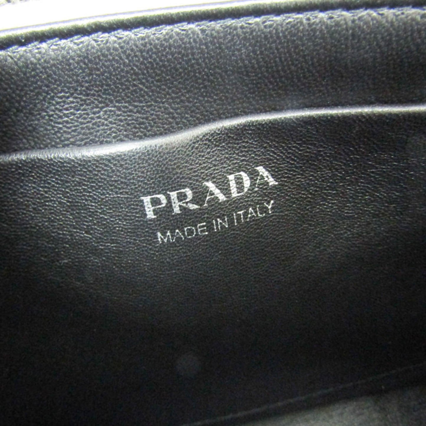 Prada Sydney · Leather Clutch