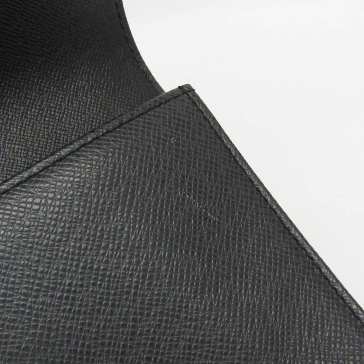 Louis Vuitton Taiga Selenga · Clutch