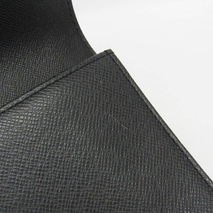 Louis Vuitton Taiga Selenga · Clutch