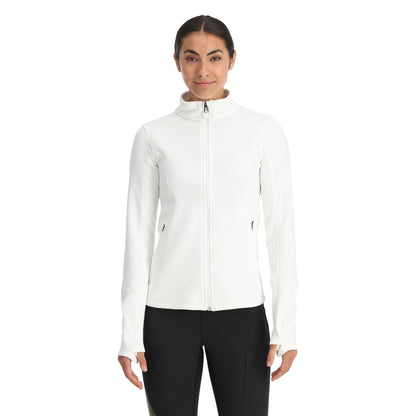 A woman wearing a white full zip Activewear sweatshirt with thumbholes, paired with black pants.