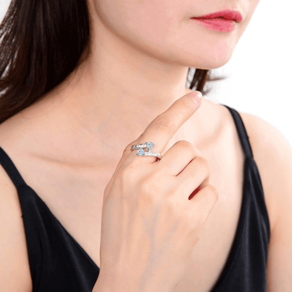 1.10 Ct Trillon Cut Light Blue Aquamarine V-Prong Rhodium Over Silver Dual Stone Bypass Ring