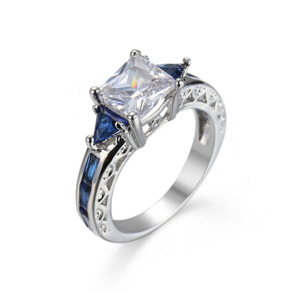 Navy Crystal & Silvertone Prong Illusion Ring