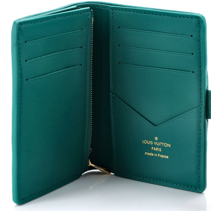 Capucines Vertical Wallet Leather Compact