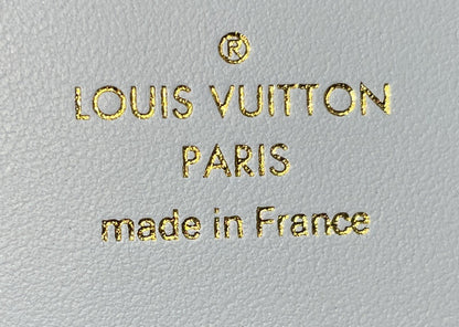 Capucines Vertical Wallet Leather Compact
