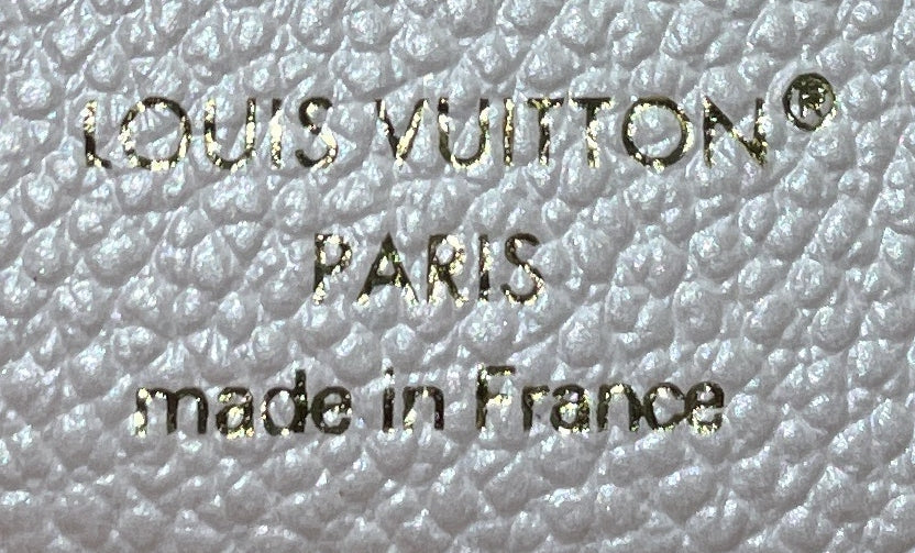 Lisa Wallet Monogram Empreinte Leather Compact