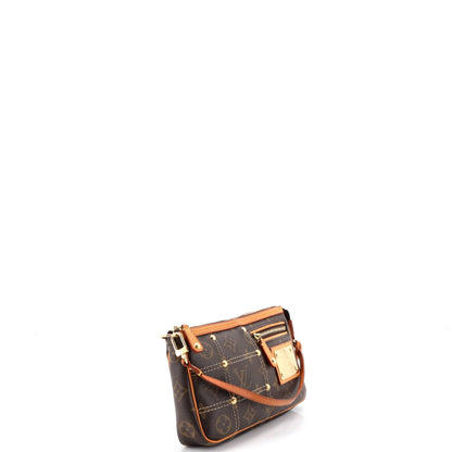 Riveting Pochette Accessoires Monogram Canvas
