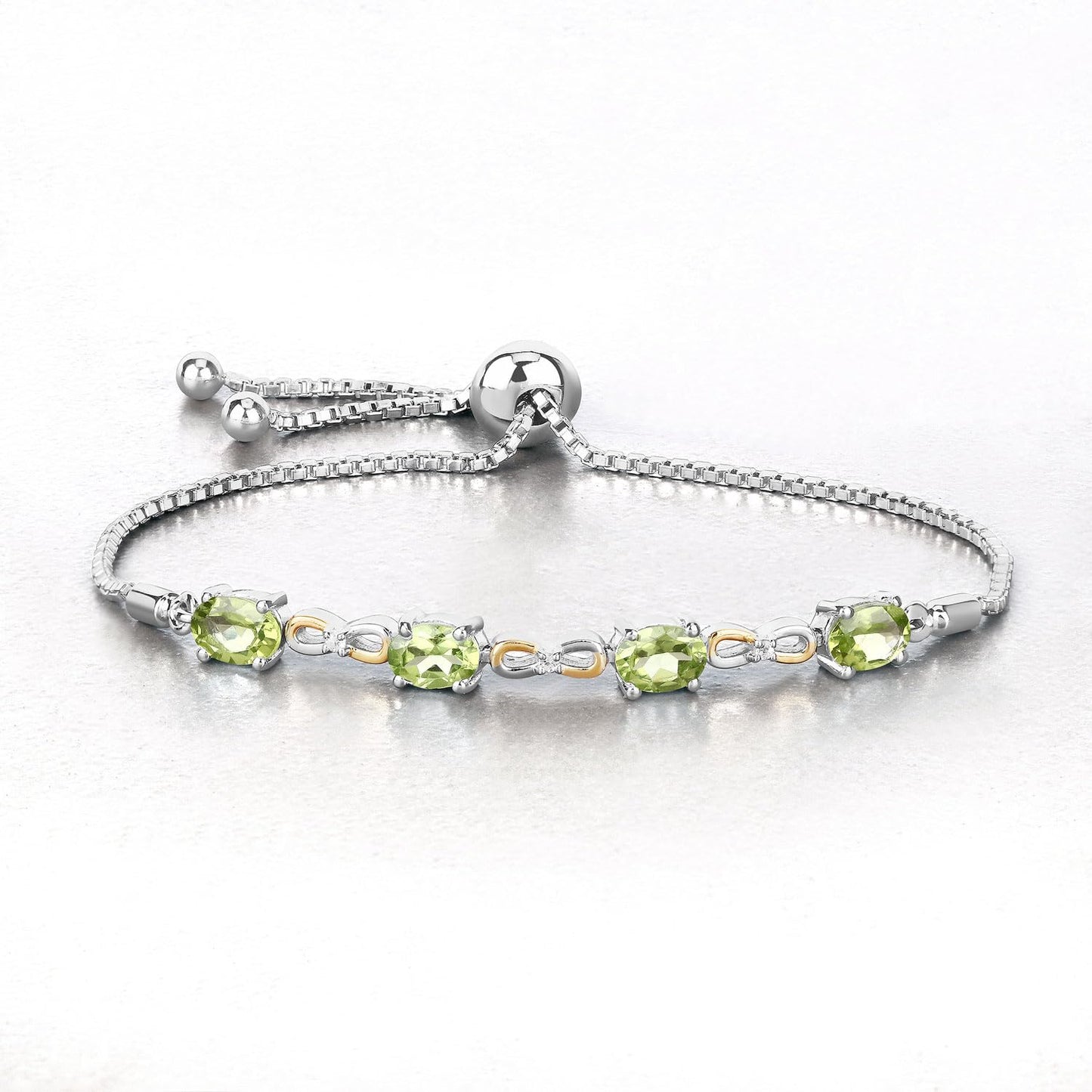 Oval Green Peridot Prong Two-Tone Gold Plated Silver Infinity Bolo Adjustable Bracelet