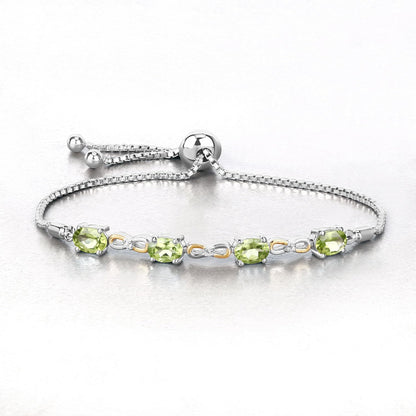 Oval Green Peridot Prong Two-Tone Gold Plated Silver Infinity Bolo Adjustable Bracelet